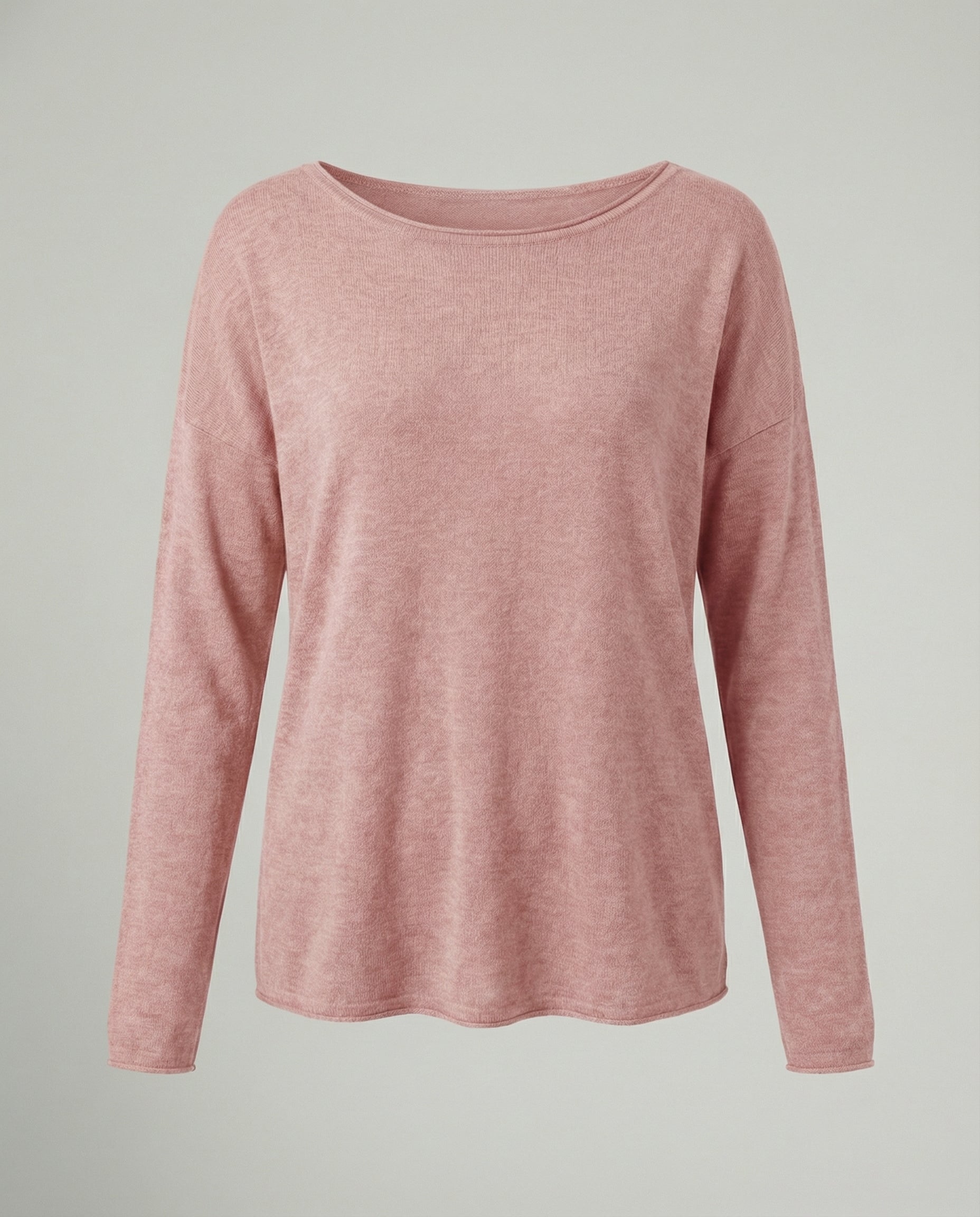 Woman wearing a lightweight long sleeve round neck top