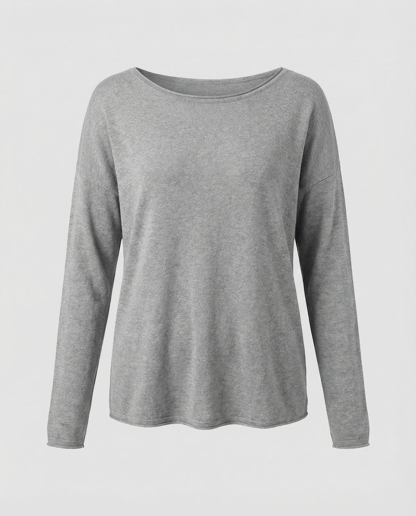 Woman wearing a lightweight long sleeve round neck top