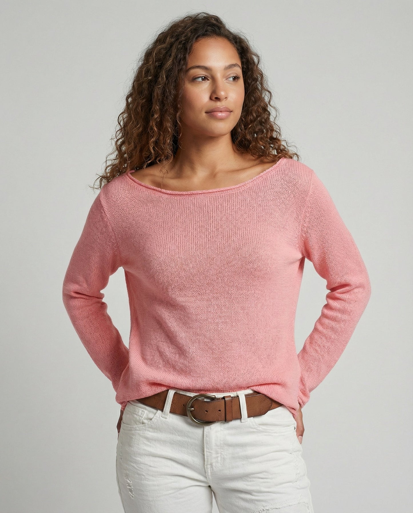 Woman wearing a lightweight long sleeve round neck top