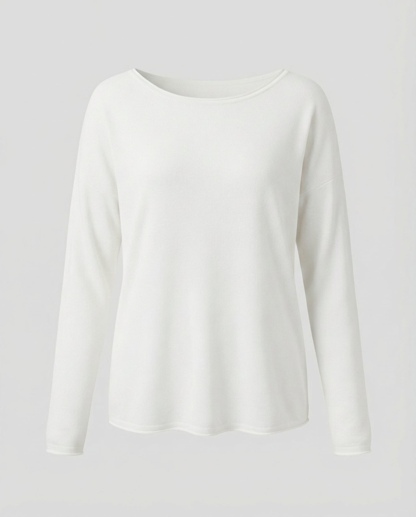 Woman wearing a lightweight long sleeve round neck top