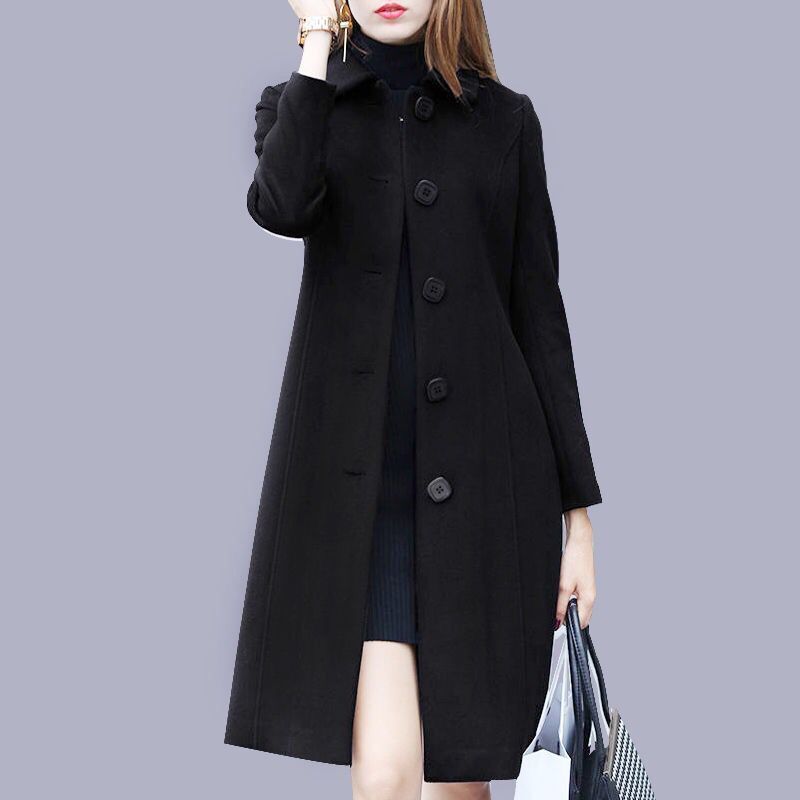 Black fit and flare trench coat for women.