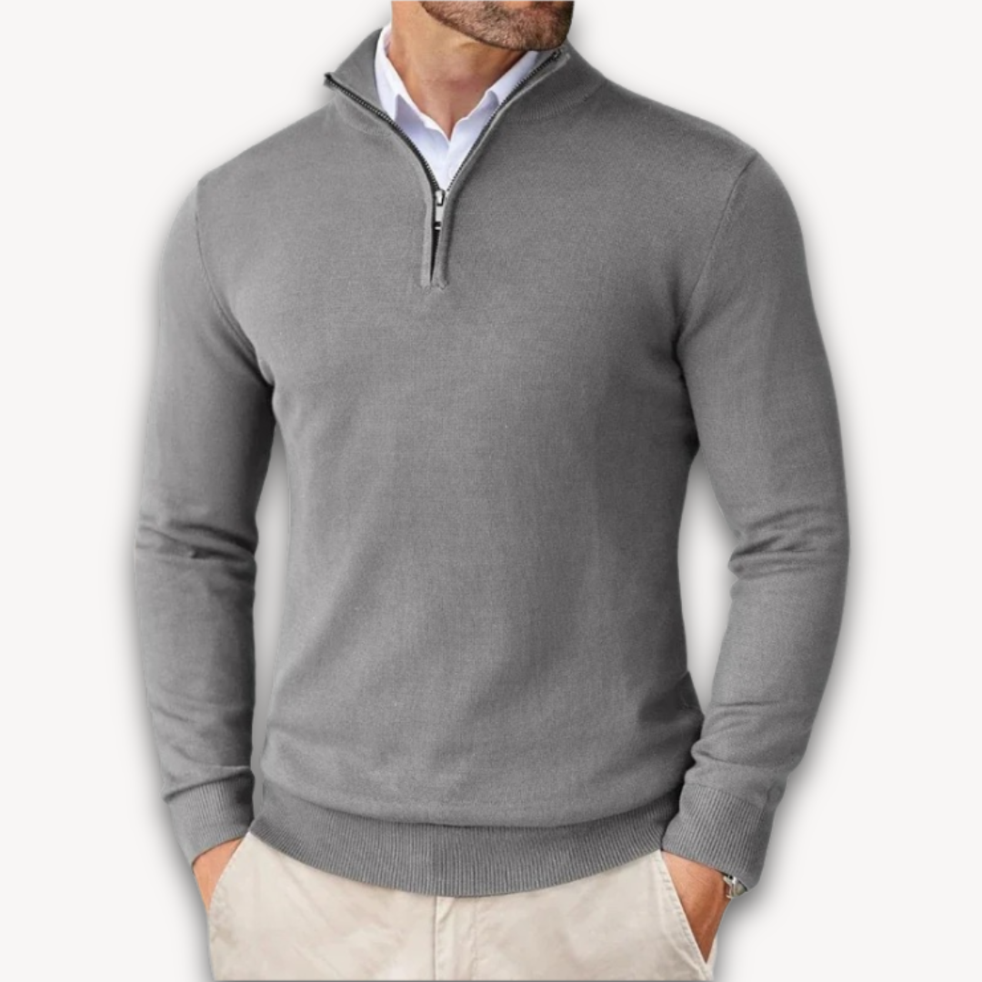 Man wearing a quarter-zip knit sweater