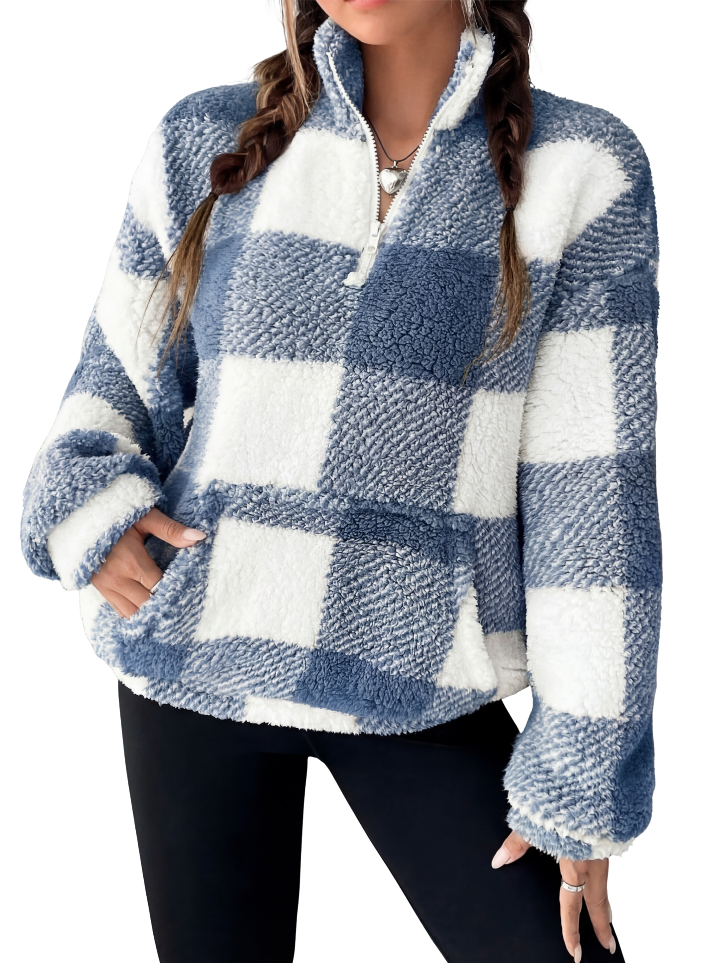Woman wearing a plaid half zip sweater