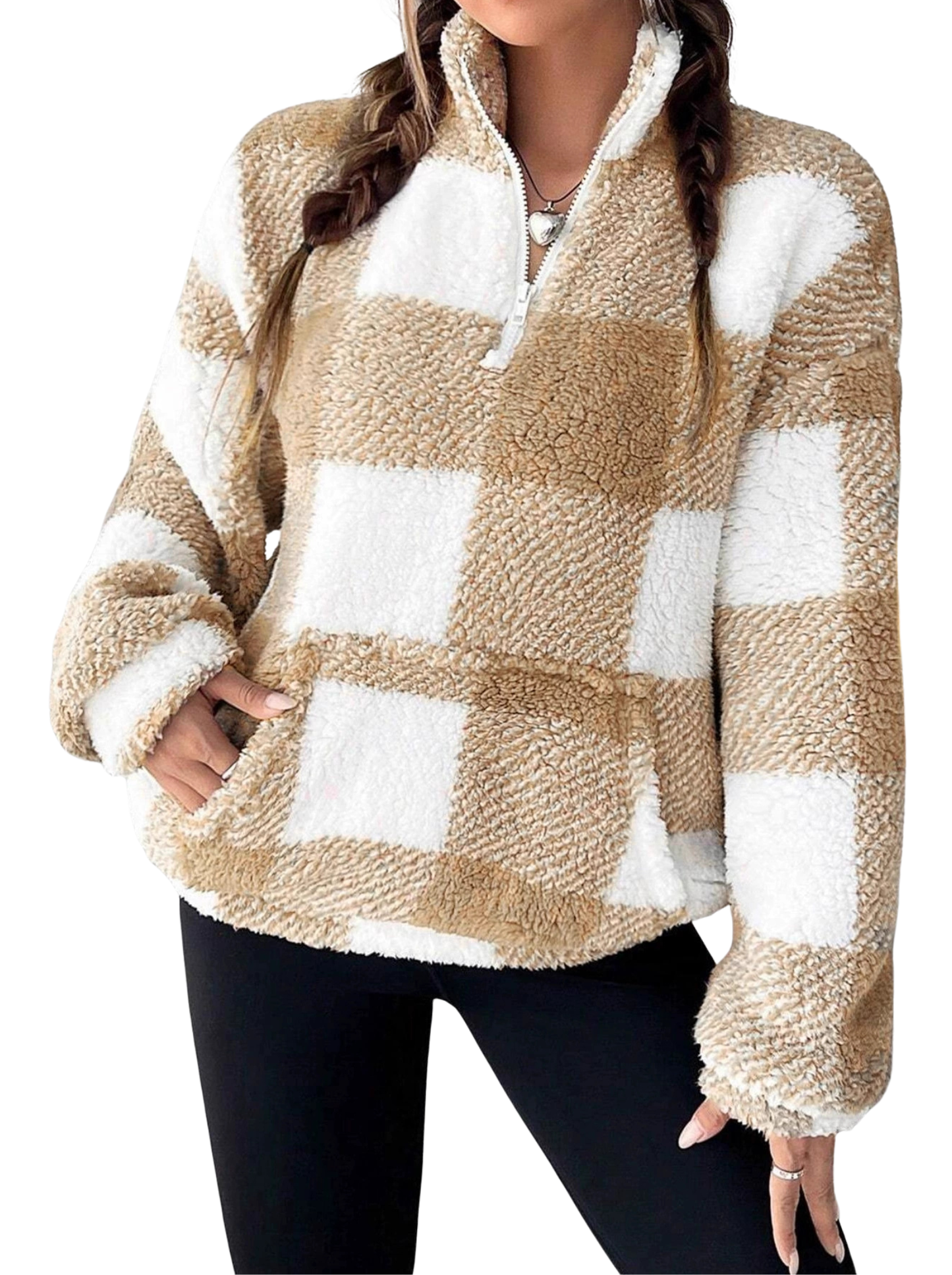 Woman wearing a plaid half zip sweater