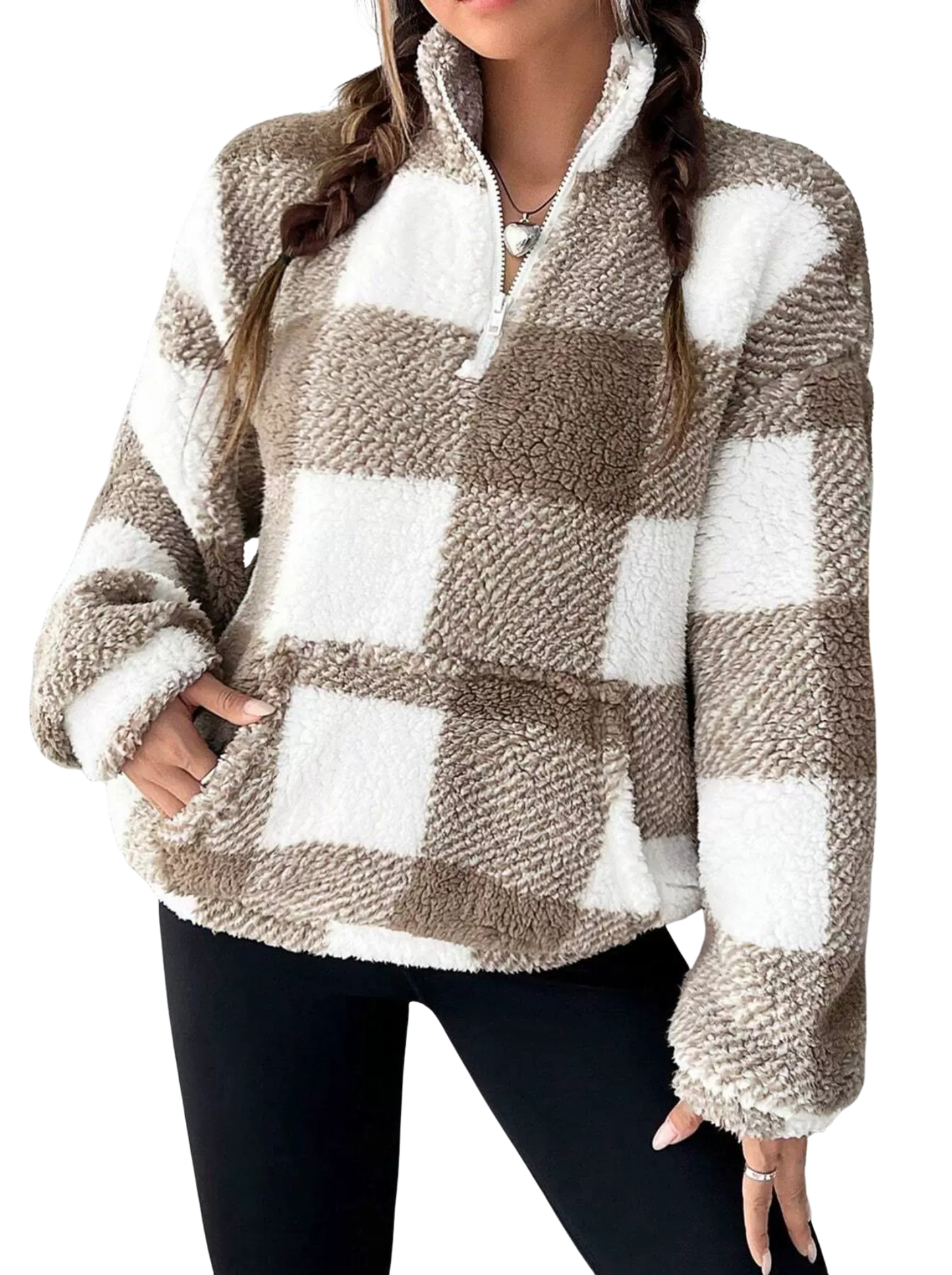 Woman wearing a plaid half zip sweater