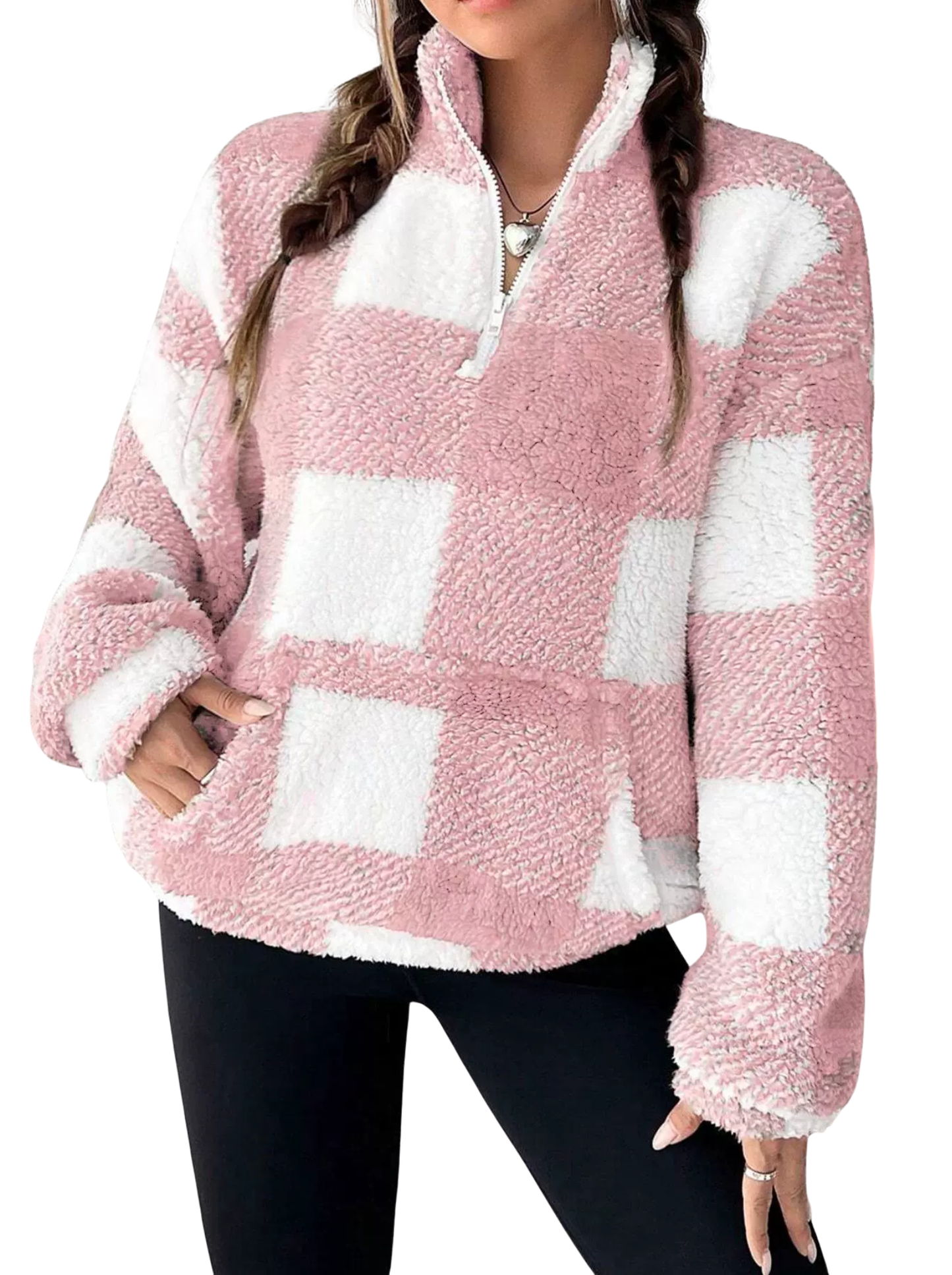 Woman wearing a plaid half zip sweater