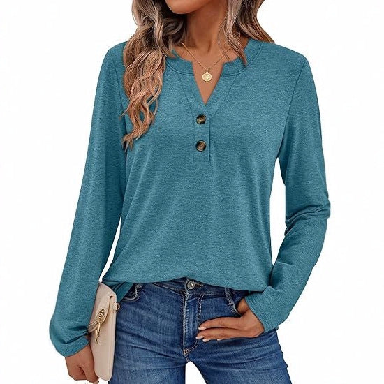 Woman wearing a V-neck long sleeve t-shirt with button detail