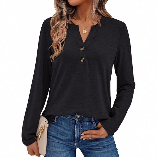 Woman wearing a V-neck long sleeve t-shirt with button detail