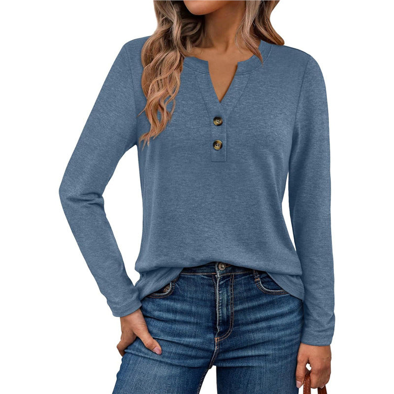 Woman wearing a V-neck long sleeve t-shirt with button detail