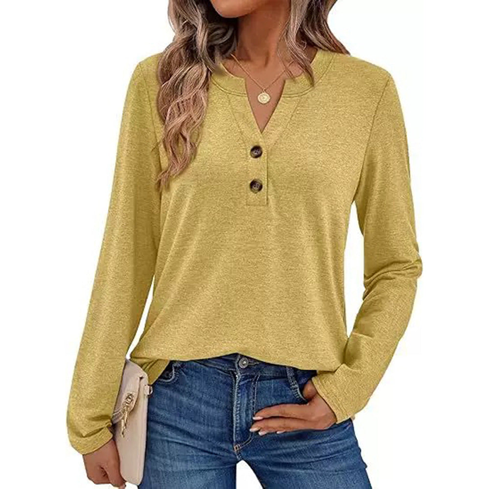 Woman wearing a V-neck long sleeve t-shirt with button detail