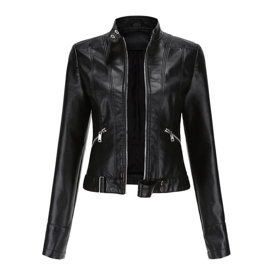 Woman wearing a slim fit faux leather biker jacket with stand collar and zip front