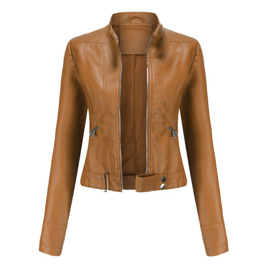 Woman wearing a slim fit faux leather biker jacket with stand collar and zip front