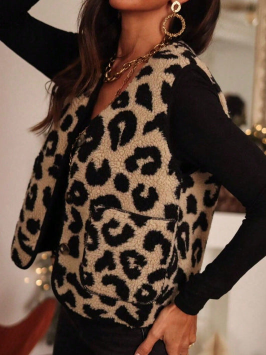 Woman wearing a cozy sherpa-textured button-up vest