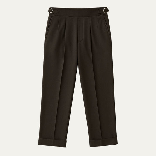 Man wearing formal pleated dress pants