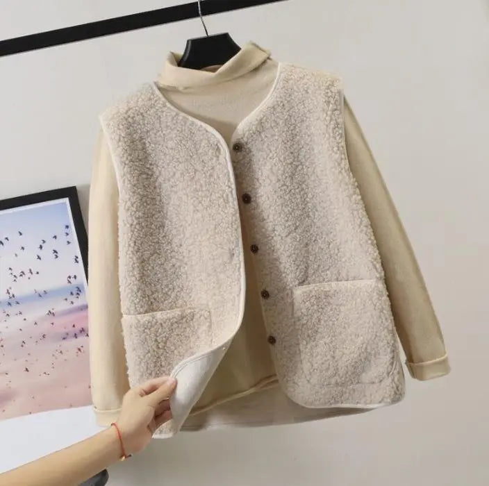 Ivory relaxed fit vest for women.