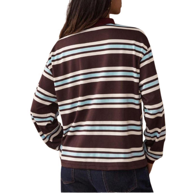 Woman wearing a striped long sleeve round neck top