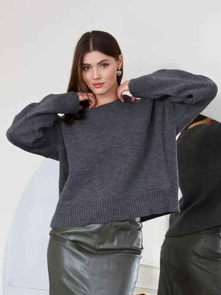 Woman wearing a cozy oversized crew neck sweater