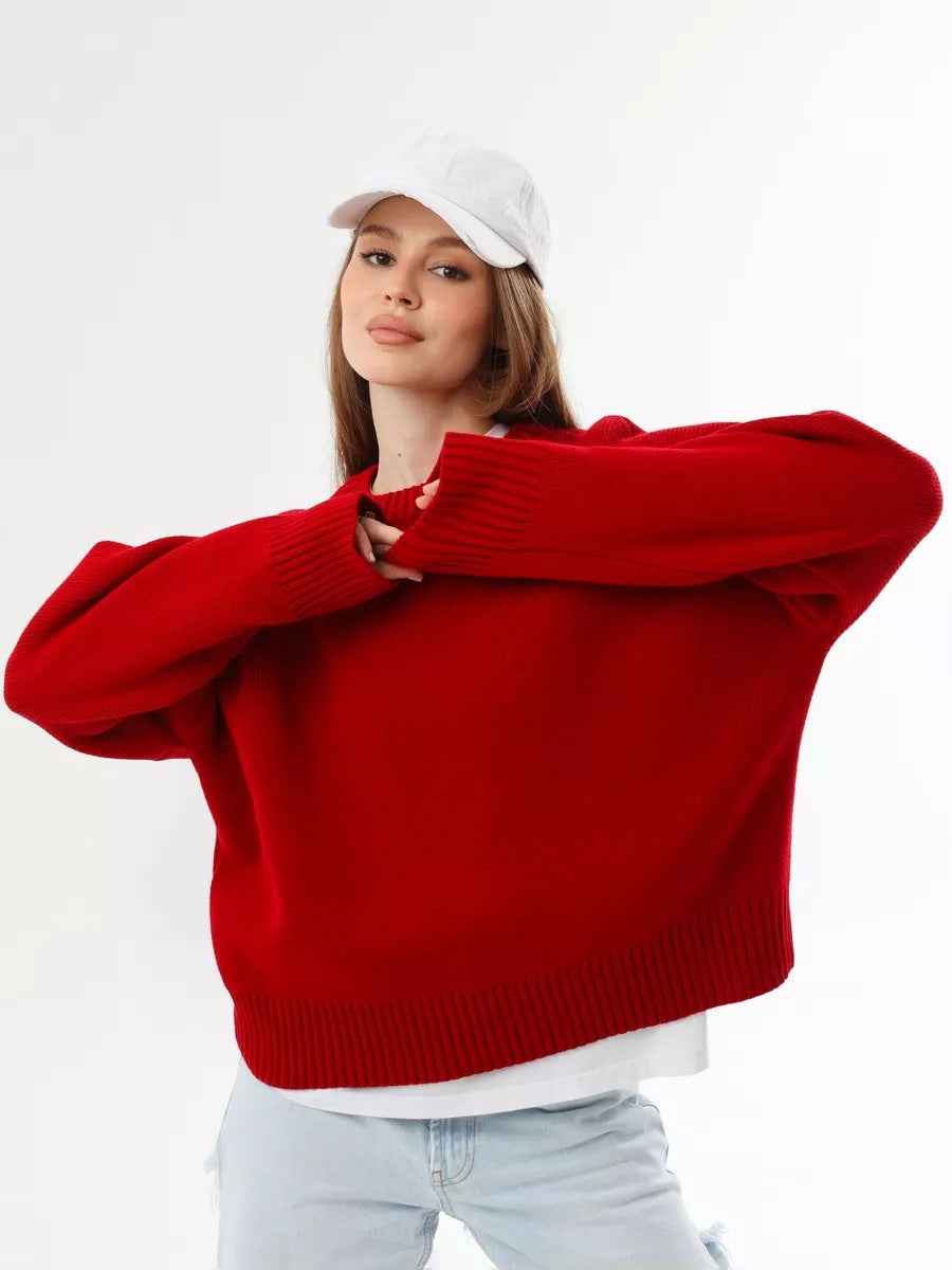 Woman wearing a cozy oversized crew neck sweater