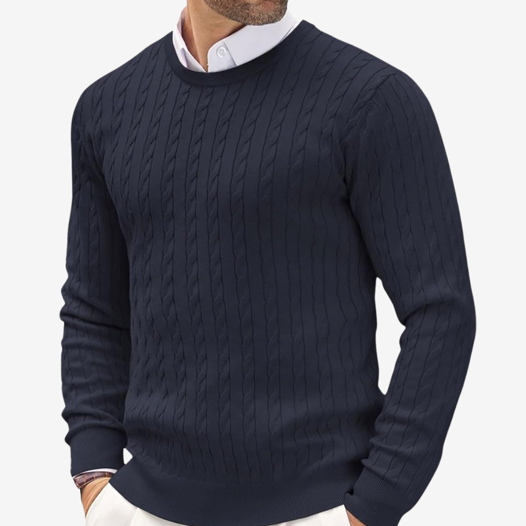Man wearing a classic cable knit crew neck sweater