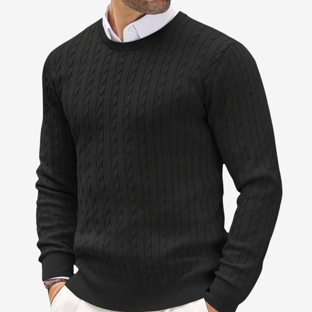 Man wearing a classic cable knit crew neck sweater