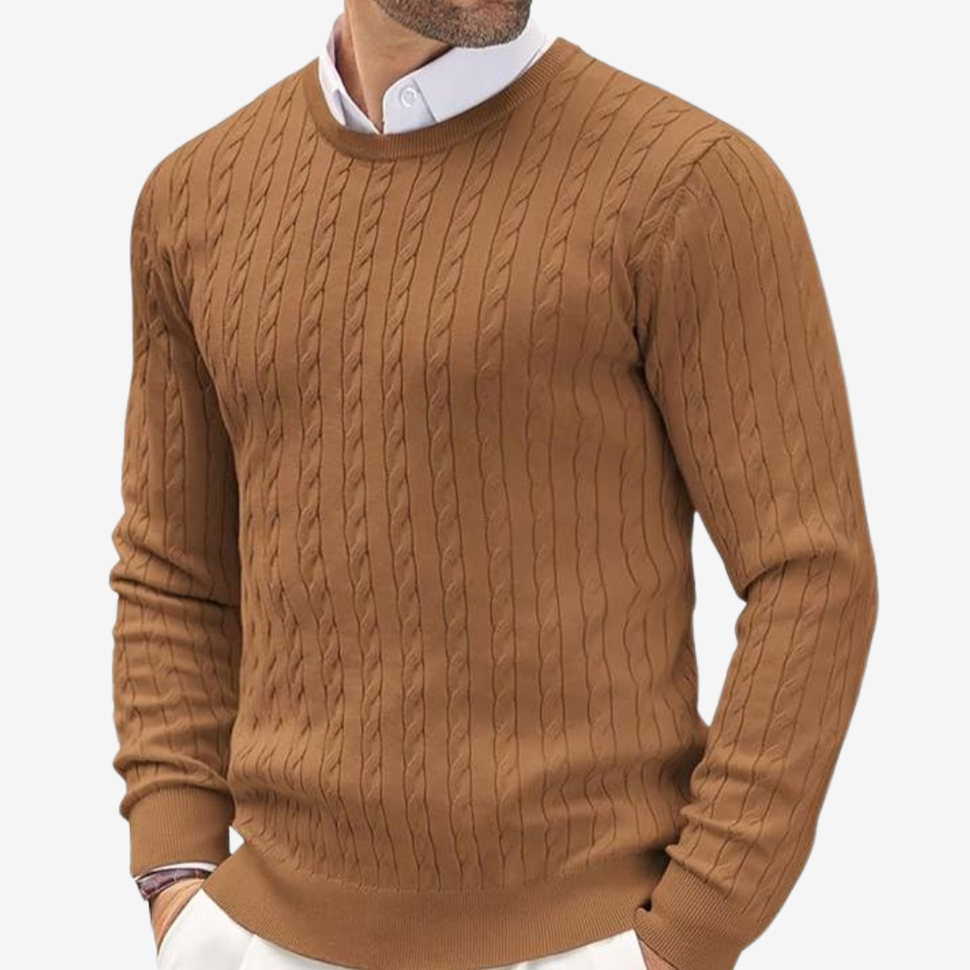 Man wearing a classic cable knit crew neck sweater