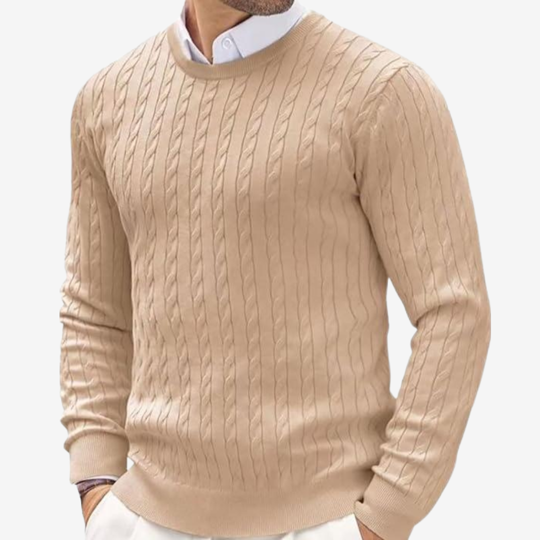 Man wearing a classic cable knit crew neck sweater