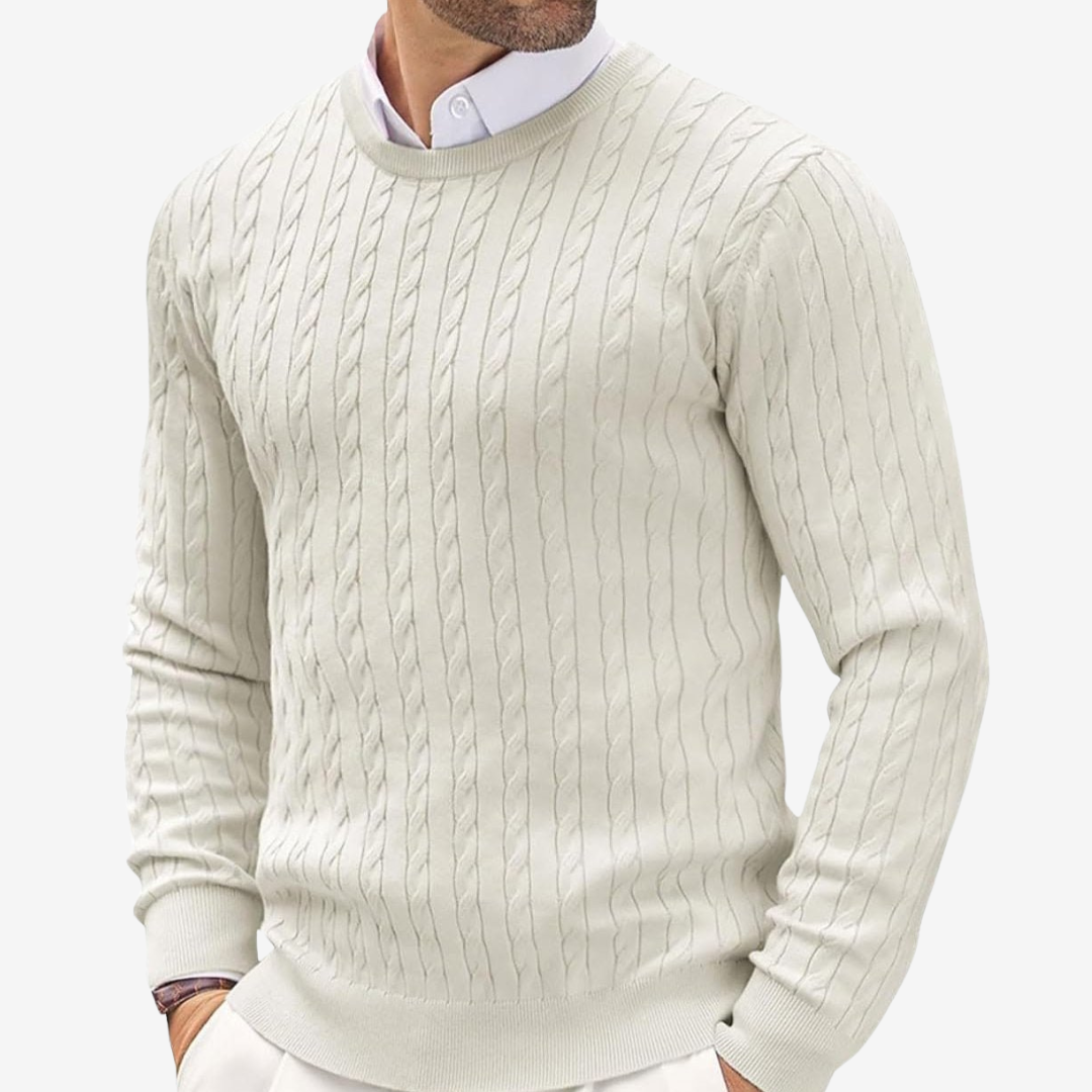 Man wearing a classic cable knit crew neck sweater