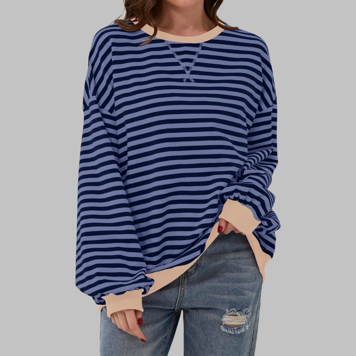 Woman wearing a striped round neck long sleeve t-shirt