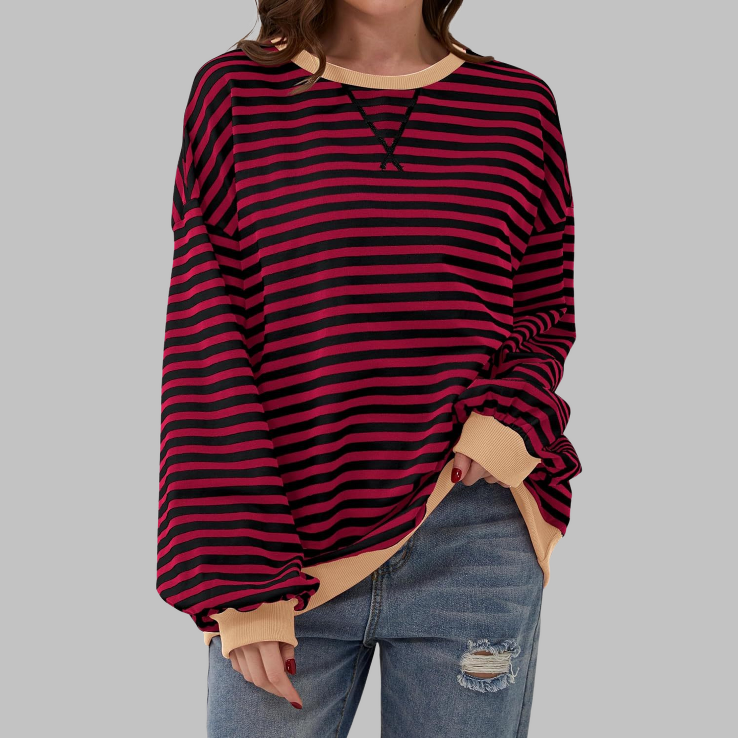 Woman wearing a striped round neck long sleeve t-shirt