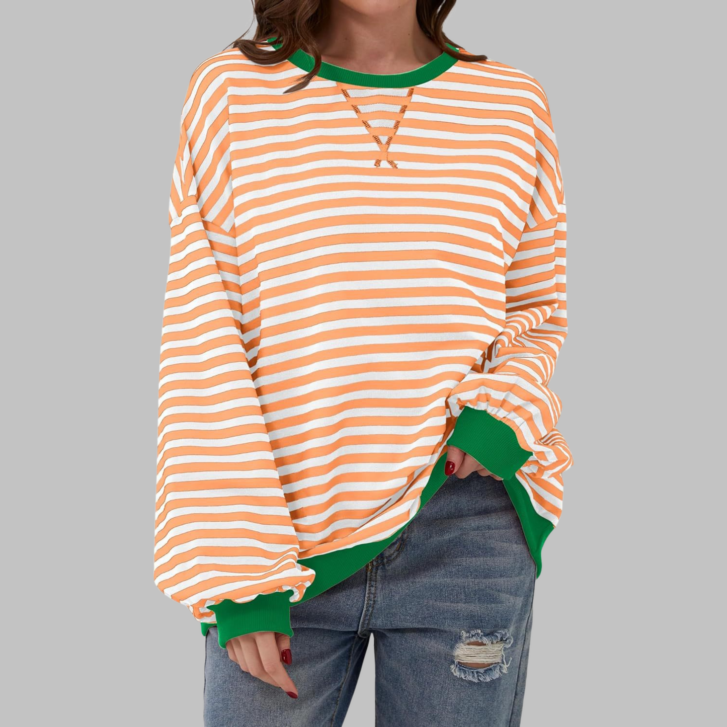 Woman wearing a striped round neck long sleeve t-shirt