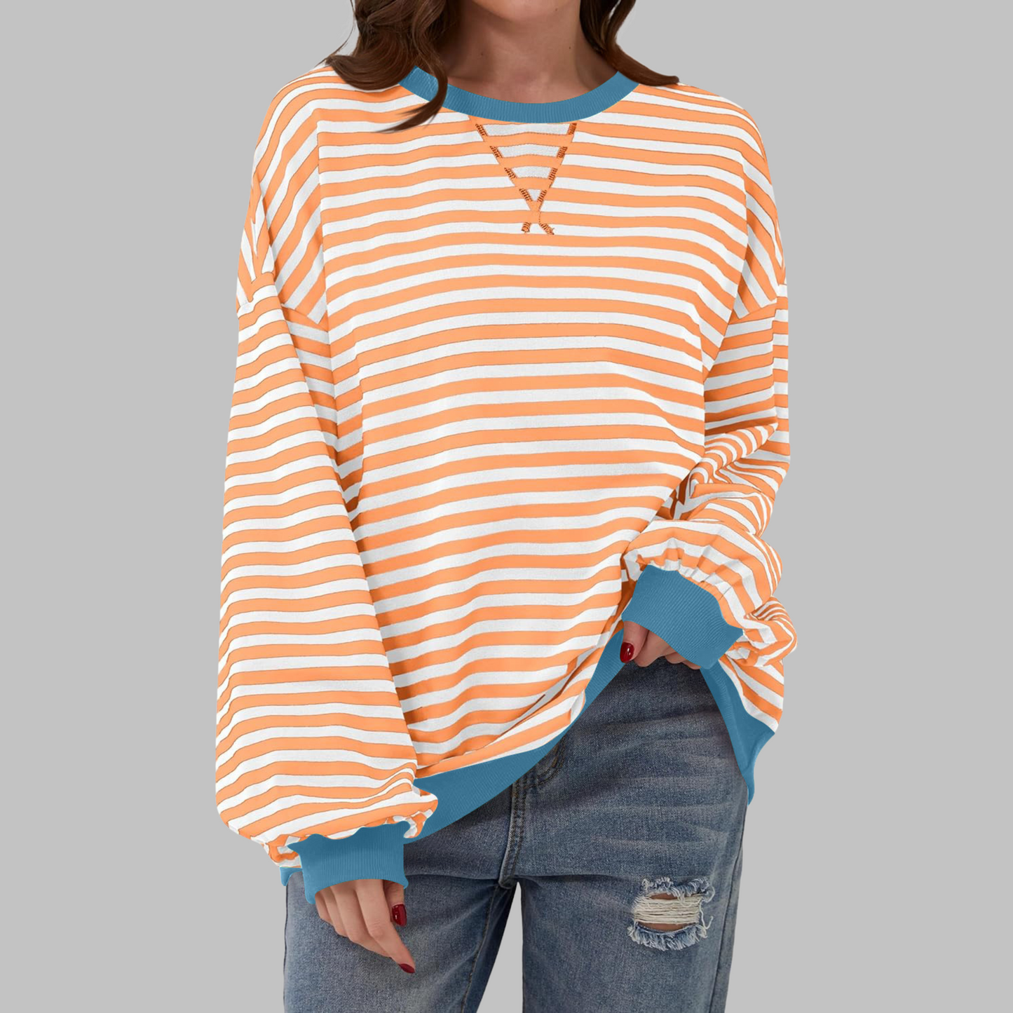 Woman wearing a striped round neck long sleeve t-shirt