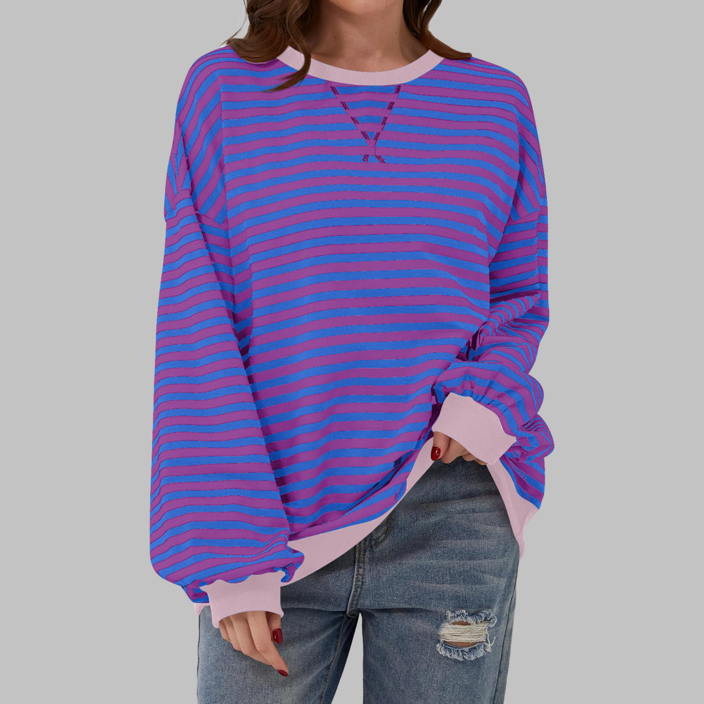 Woman wearing a striped round neck long sleeve t-shirt