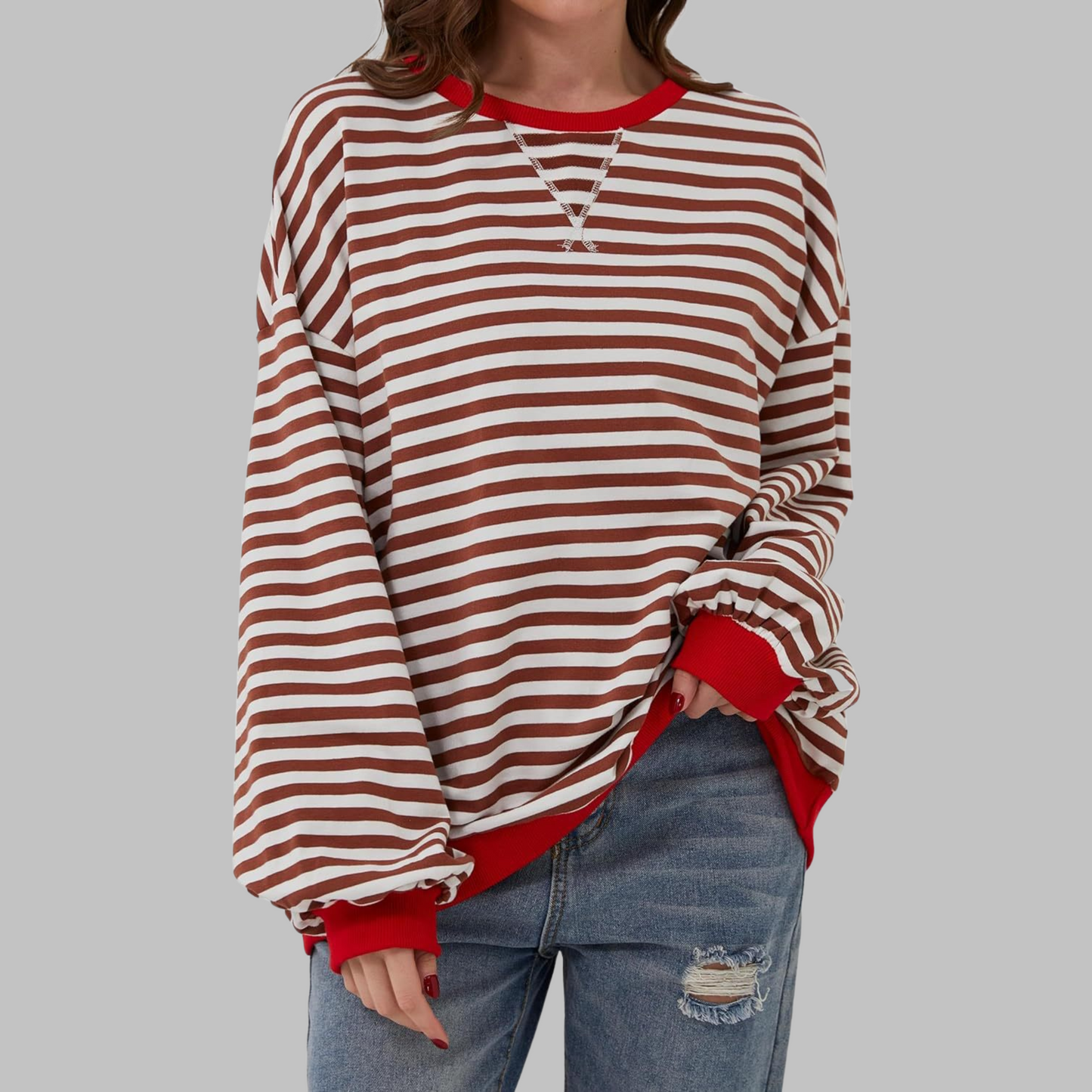 Woman wearing a striped round neck long sleeve t-shirt