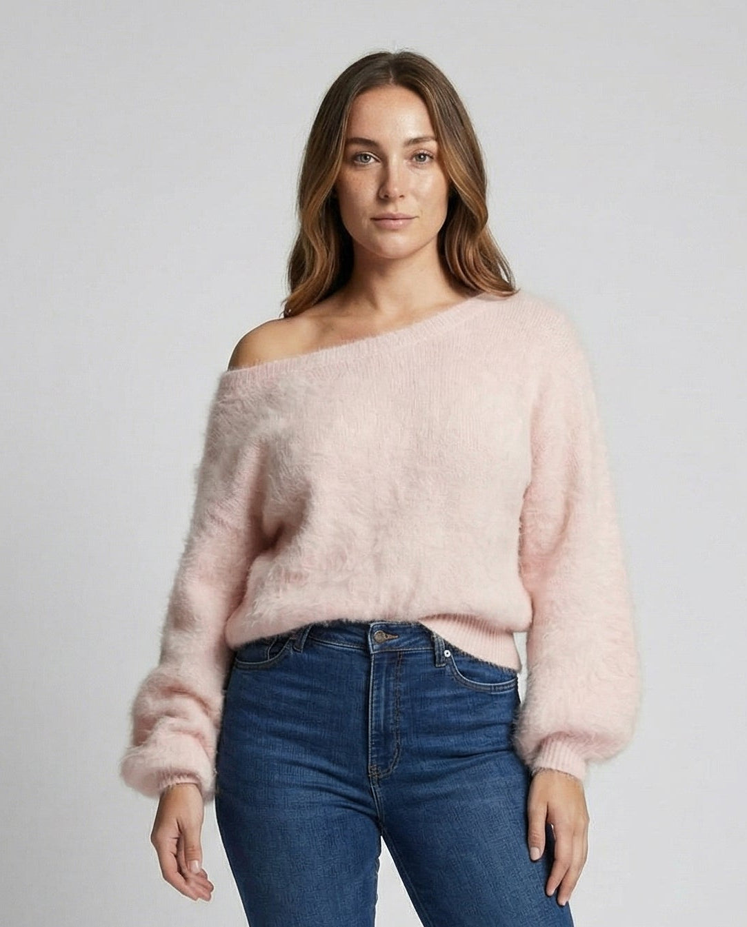 Woman wearing a fuzzy knit oversized sweater