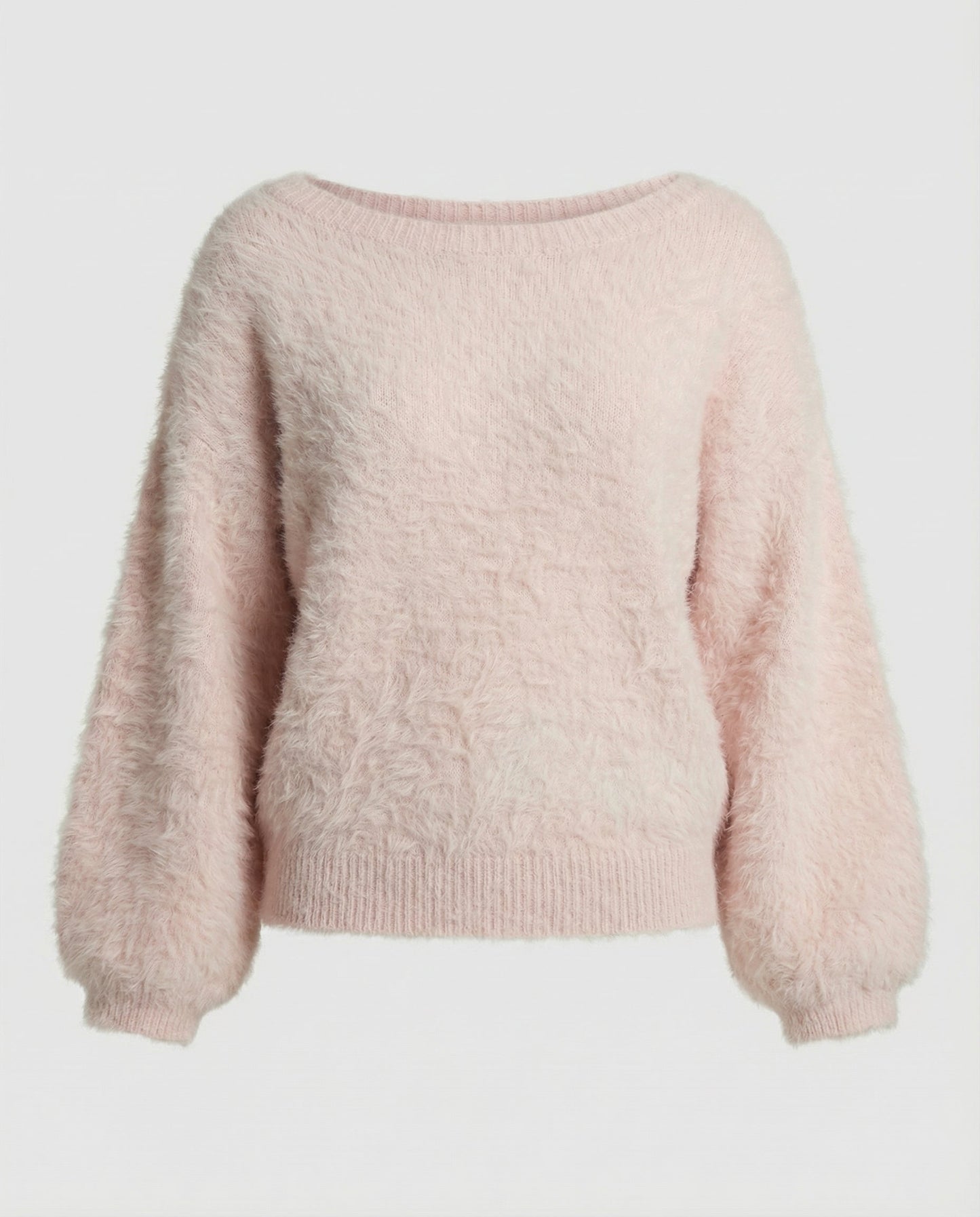 Woman wearing a fuzzy knit oversized sweater