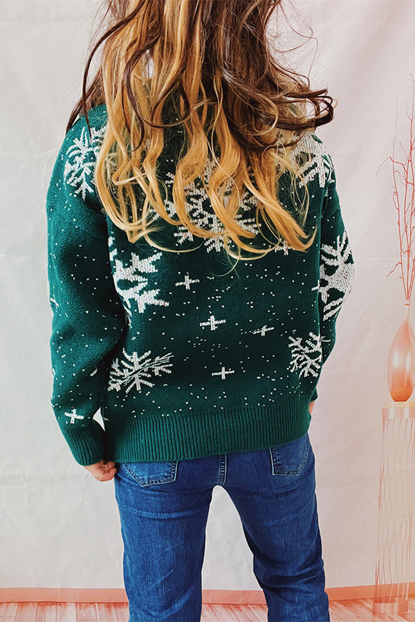 Woman wearing a festive knit Christmas sweater