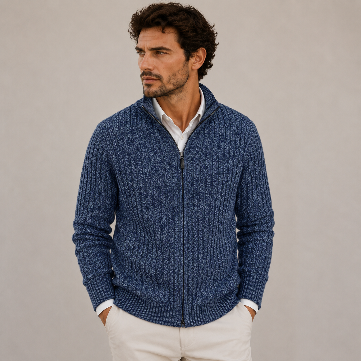 Man wearing a full zip textured knit sweater with stand-up collar