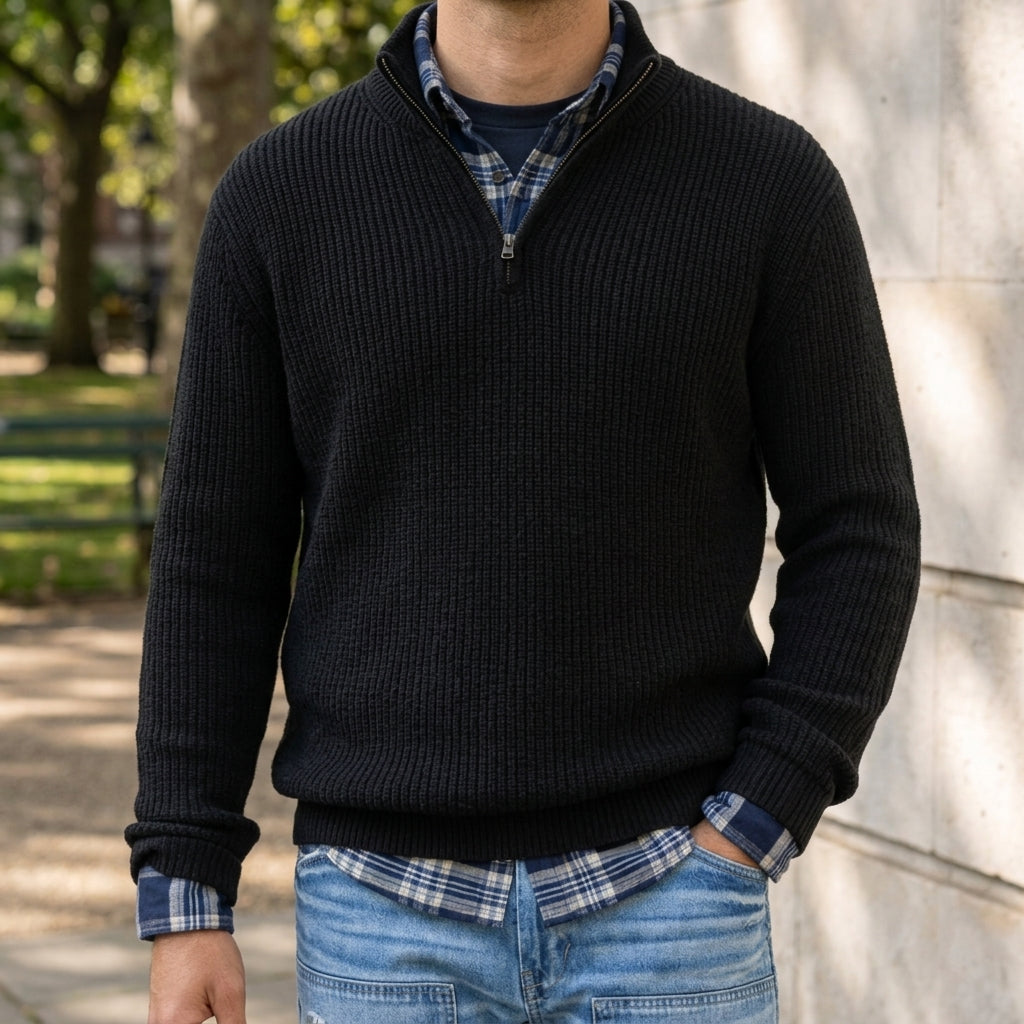 Man wearing a quarter zip ribbed cashmere blend sweater with stand collar