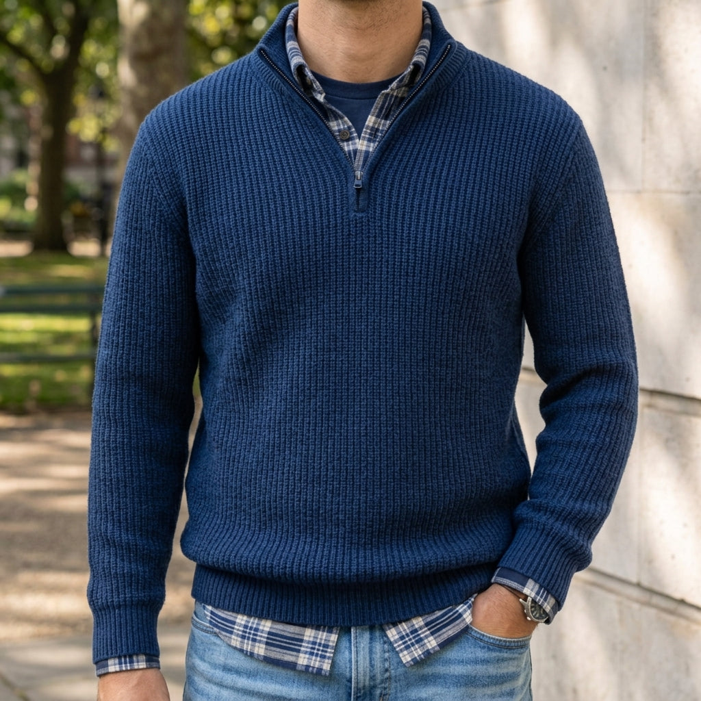Man wearing a quarter zip ribbed cashmere blend sweater with stand collar
