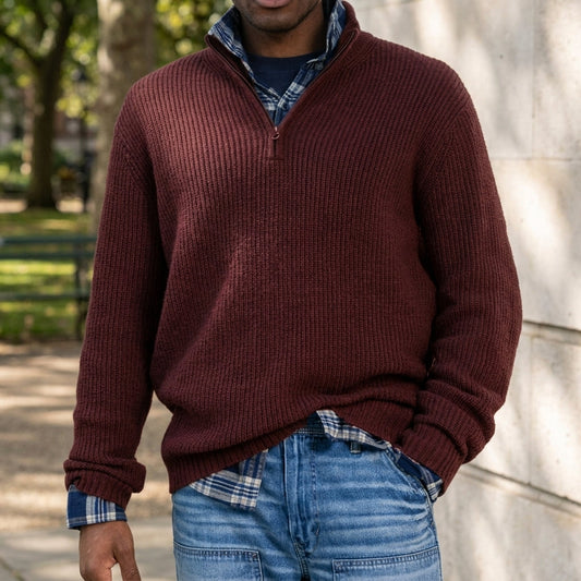 Man wearing a quarter zip ribbed cashmere blend sweater with stand collar