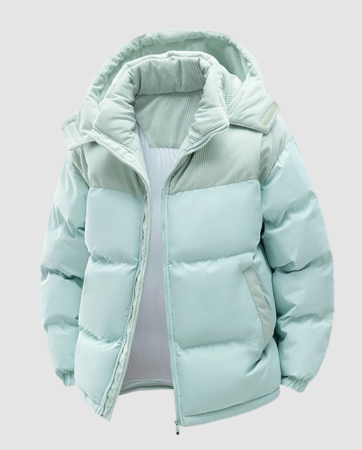 Woman wearing a hooded insulated quilted puffer jacket