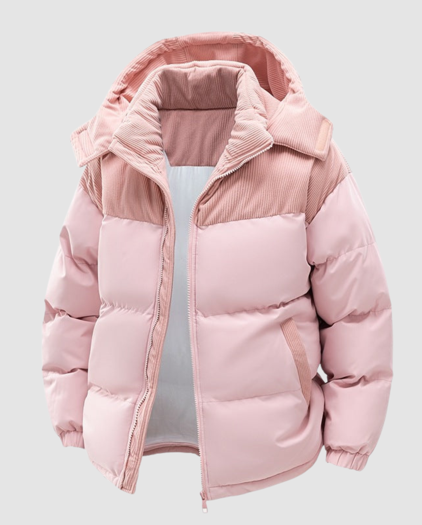 Woman wearing a hooded insulated quilted puffer jacket