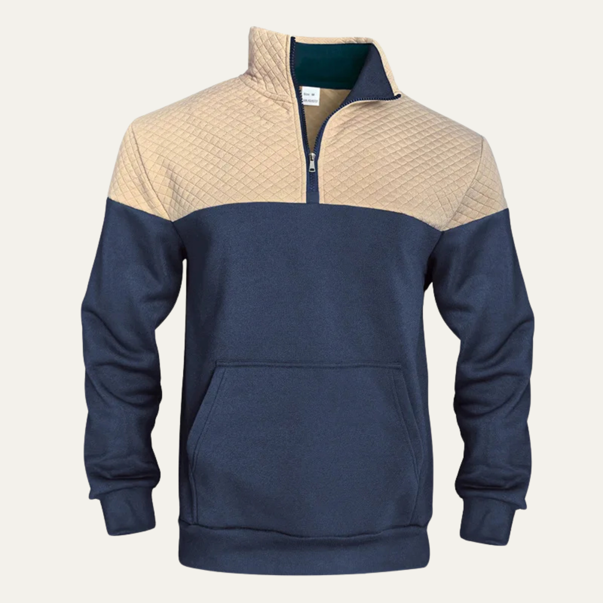 Man wearing a quilted color block half zip sweater