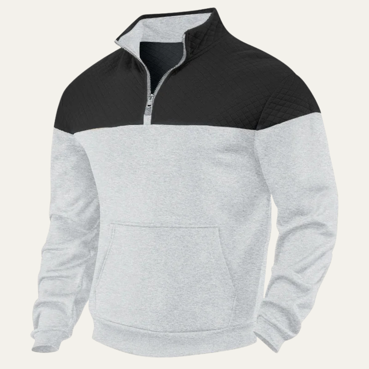 Man wearing a quilted color block half zip sweater