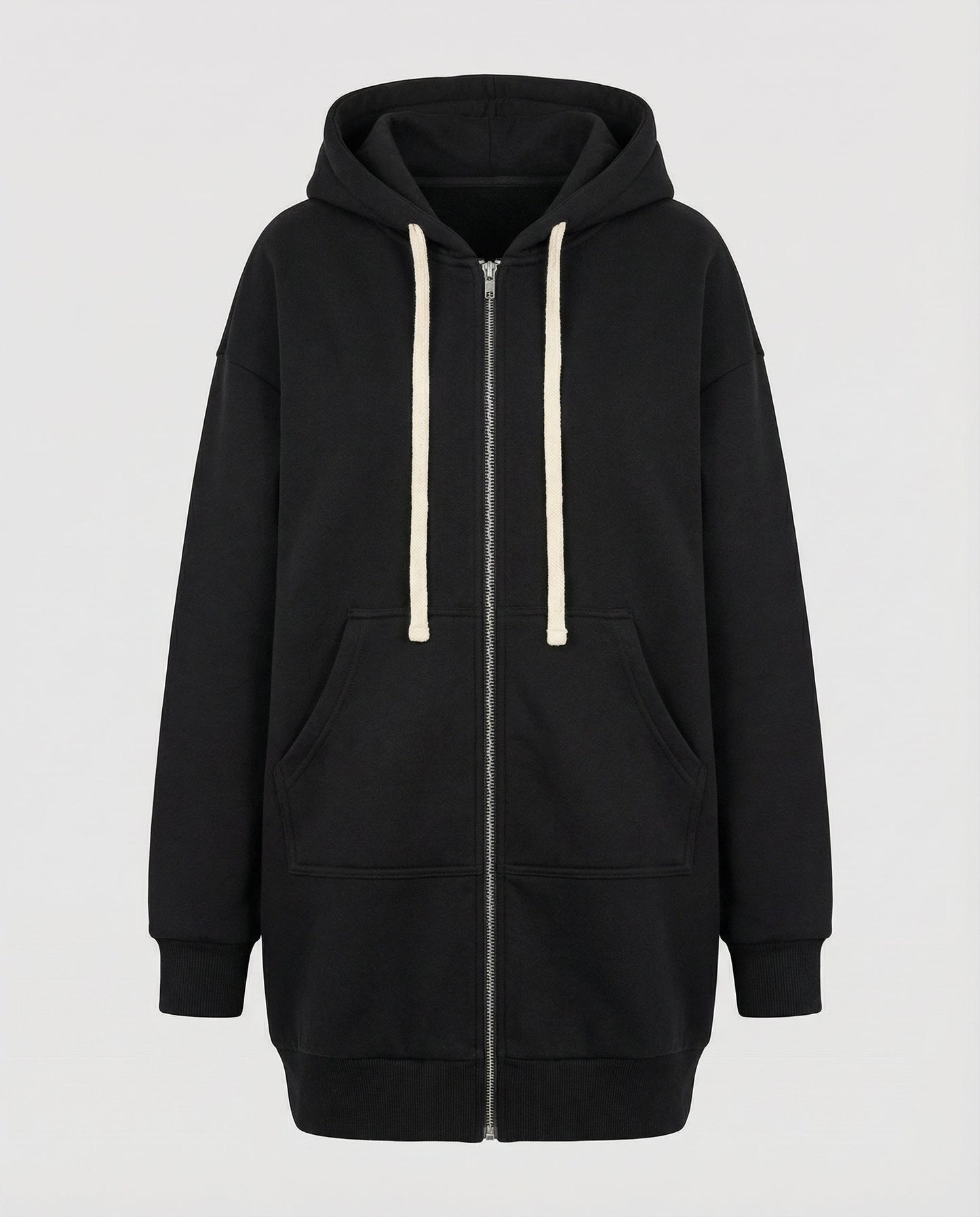 Woman wearing a knee length hooded sweatshirt