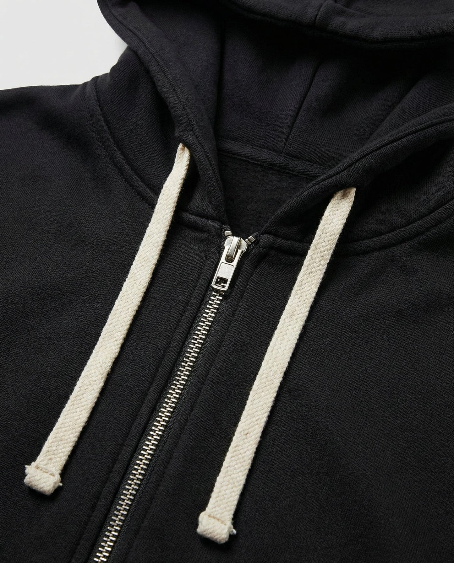 Woman wearing a knee length hooded sweatshirt