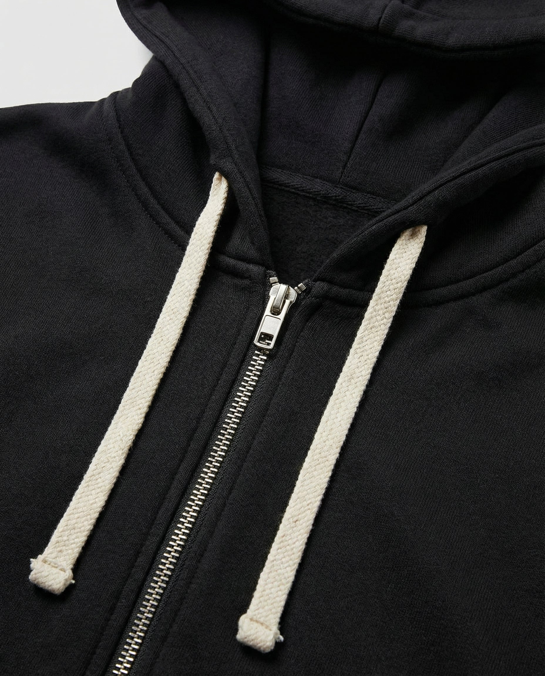 Woman wearing a knee length hooded sweatshirt
