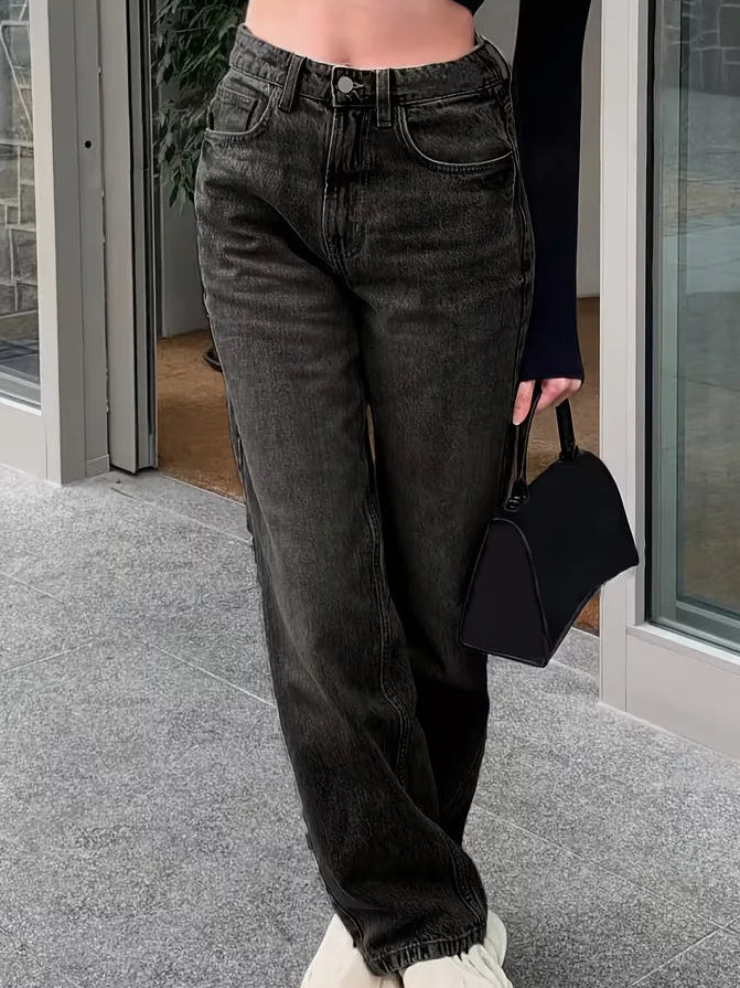 Woman wearing Liana relaxed mid rise straight leg jeans