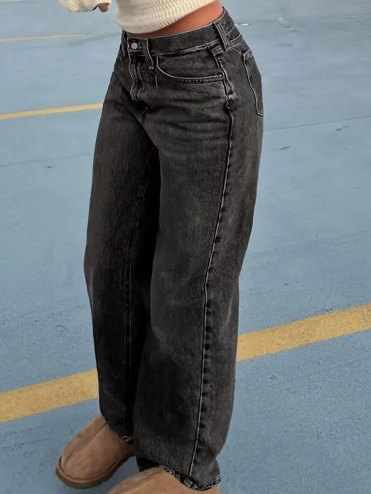 Woman wearing Liana relaxed mid rise straight leg jeans