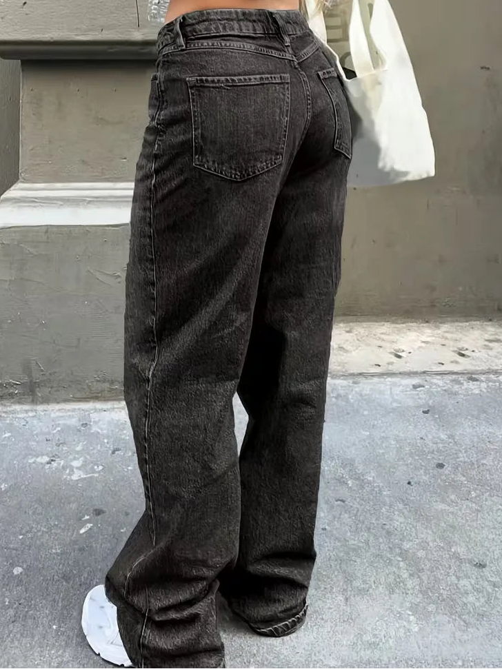 Woman wearing Liana relaxed mid rise straight leg jeans